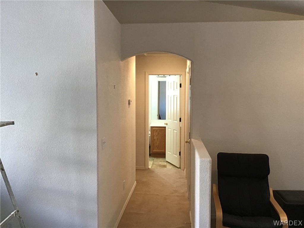 2204 Jamie Road Fort Mohave, AZ 86426 - Photo 10 of 22 a view of a bedroom from a hallway