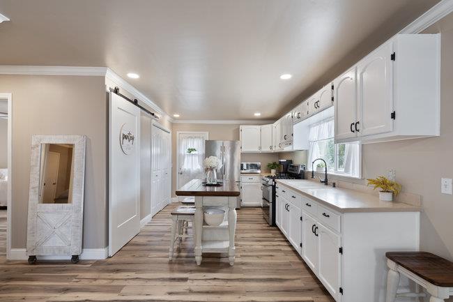 22 Heiner Road Watsonville, CA 95076 - Photo 13 of 51 a kitchen with granite countertop a sink appliances cabinets and counter space