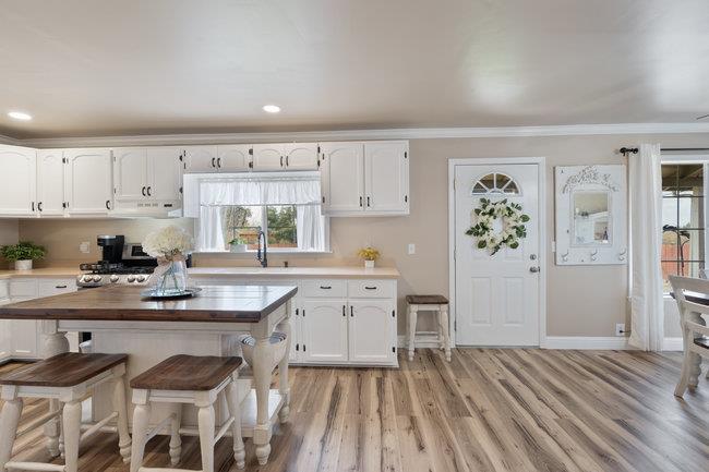 22 Heiner Road Watsonville, CA 95076 - Photo 22 of 51 a kitchen with granite countertop a sink stove and cabinets