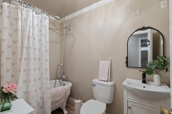 22 Heiner Road Watsonville, CA 95076 - Photo 26 of 51 a bathroom with a toilet sink and mirror
