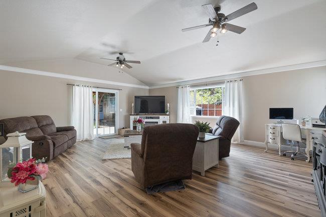 22 Heiner Road Watsonville, CA 95076 - Photo 29 of 51 a living room with furniture and a flat screen tv