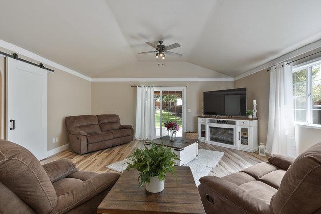 22 Heiner Road Watsonville, CA 95076 - Photo 30 of 51 a living room with furniture flat screen tv and wooden floor