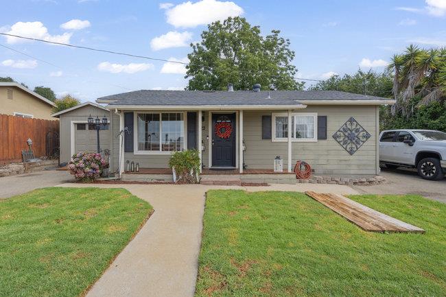 22 Heiner Road Watsonville, CA 95076 - Photo 7 of 51 a front view of house with yard and outdoor seating