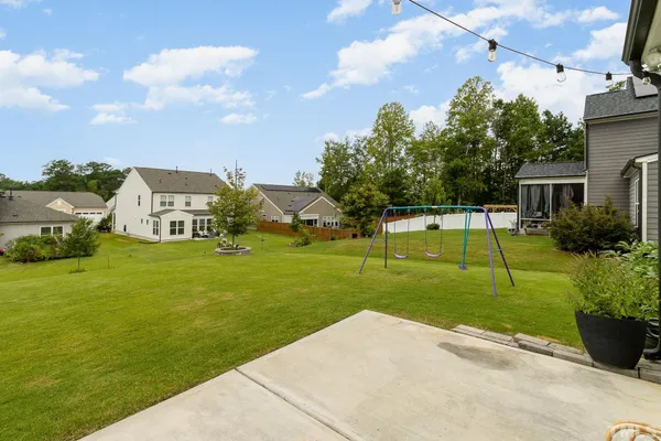 a view of a house with a big yard