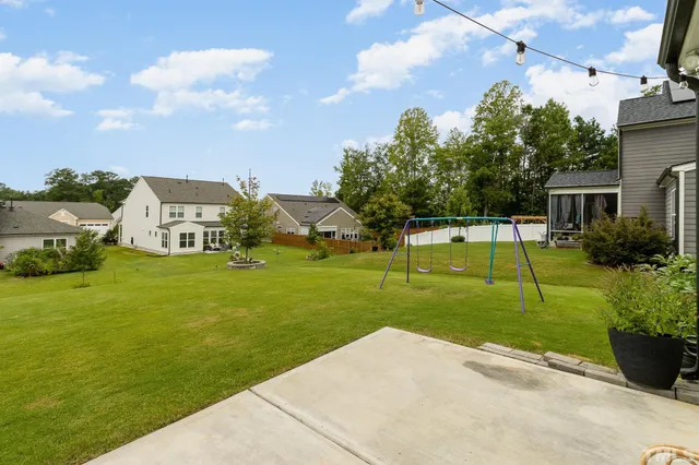 a view of a house with a big yard