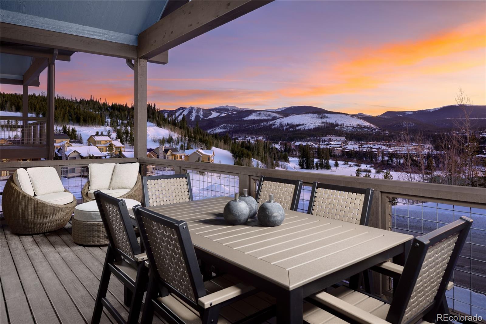 77 High Grove Loop Winter Park, CO 80482 - Photo 14 of 14 a view of a roof deck with dining table and chairs with wooden floor