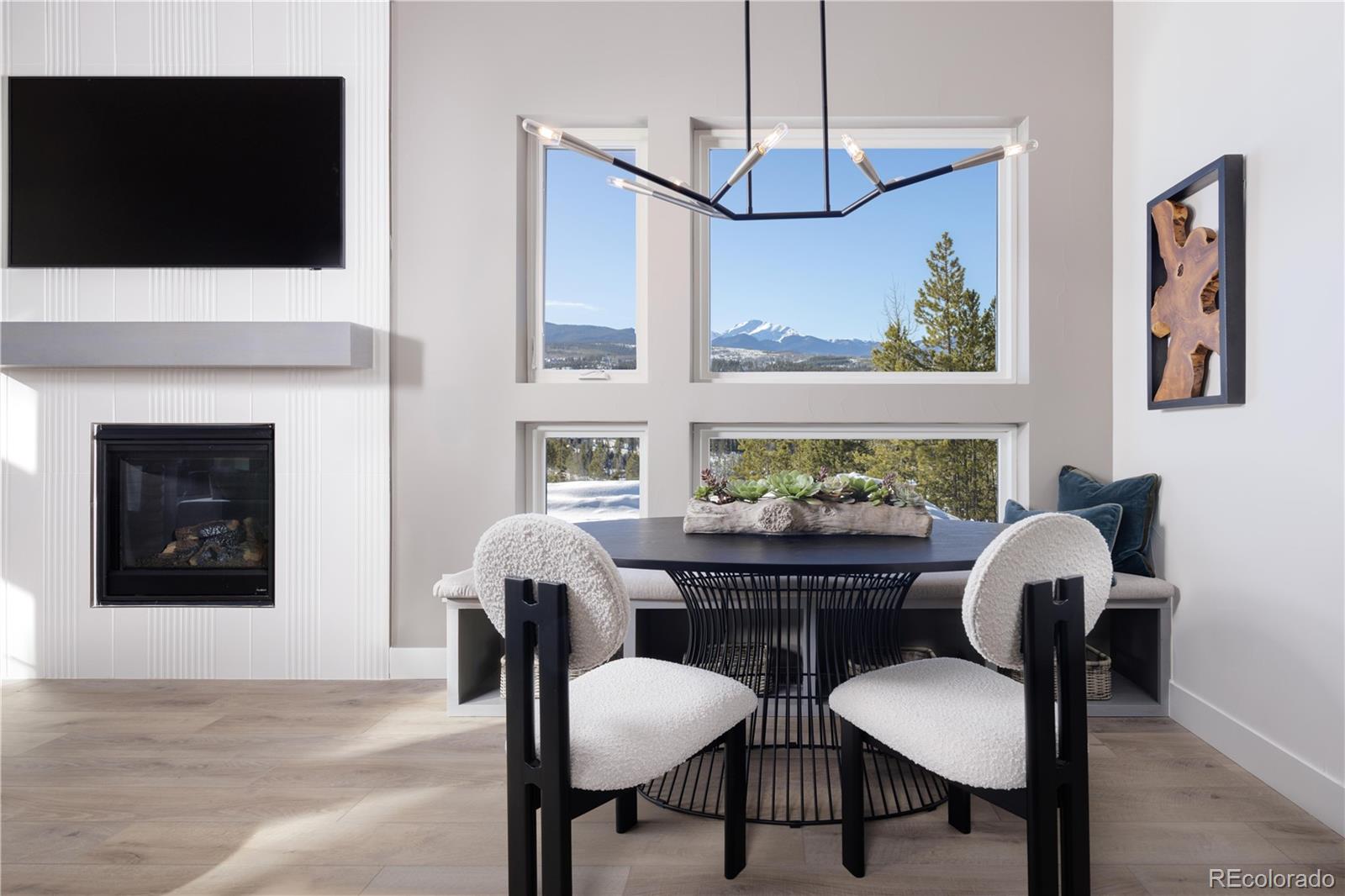77 High Grove Loop Winter Park, CO 80482 - Photo 3 of 14 a view of a dining room with furniture and wooden floor