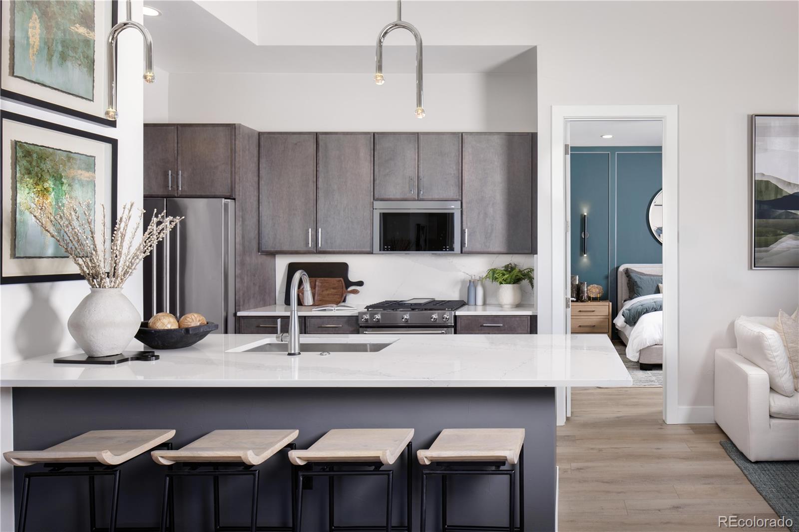77 High Grove Loop Winter Park, CO 80482 - Photo 5 of 14 a kitchen with appliances a sink and cabinets
