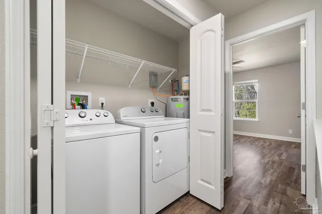 a utility room with dryer and washer