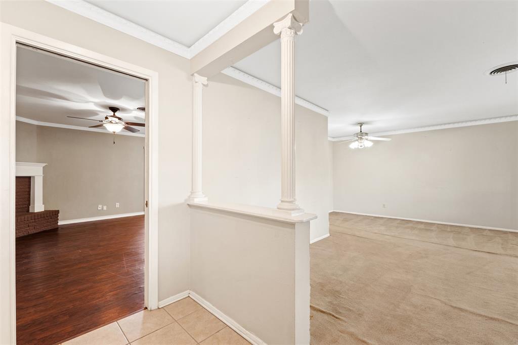 913 North Main Street Springtown, TX 76082 - Photo 7 of 40 wooden floor in an empty room