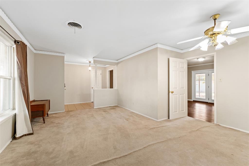 913 North Main Street Springtown, TX 76082 - Photo 10 of 40 a view of an empty room with a window