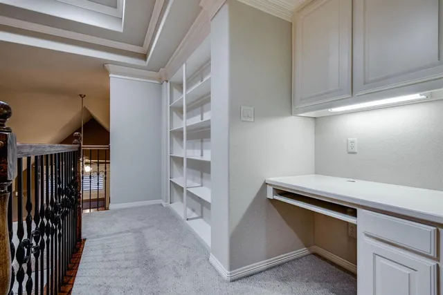 a utility room with cabinets