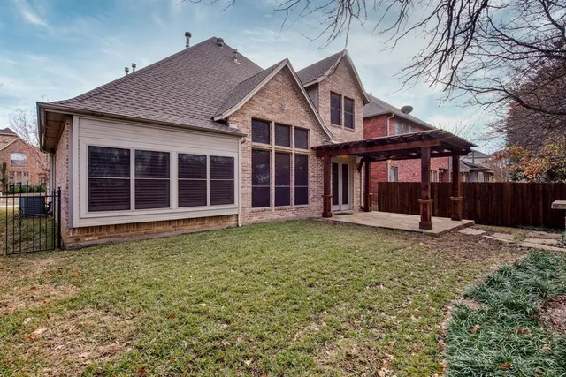 a house with yard in front of it
