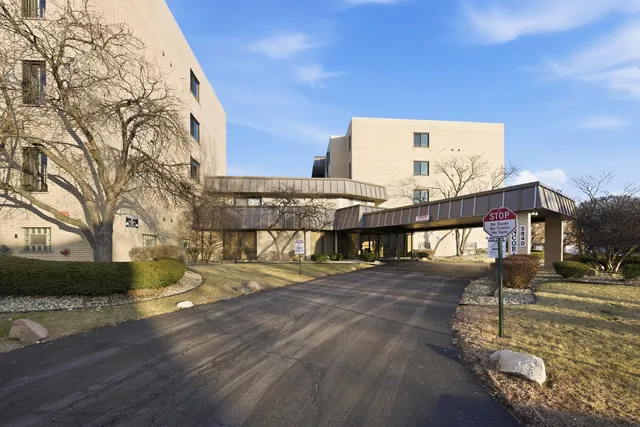a view of a water fountain in front of the house