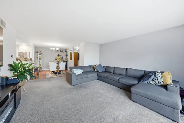 a living room with furniture and a couch