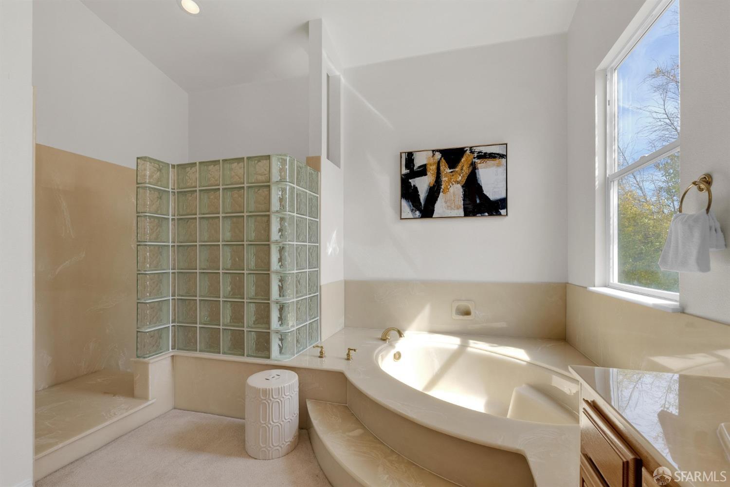 624 Sunflower Court San Ramon, CA 94582 - Photo 11 of 21 a bathroom with a tub and sink