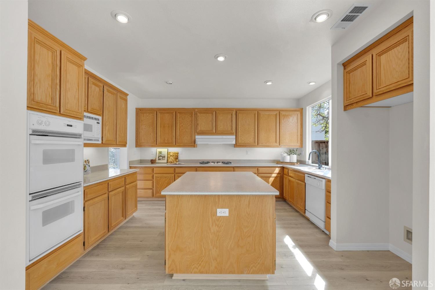 624 Sunflower Court San Ramon, CA 94582 - Photo 4 of 21 a kitchen with stainless steel appliances granite countertop a sink a stove and refrigerator