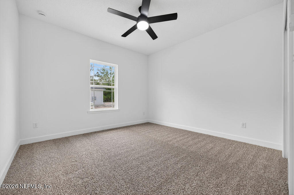 18 Bitterroot Avenue Middleburg, FL 32068 - Photo 12 of 27 8330NW188AVESTAKEFL-25