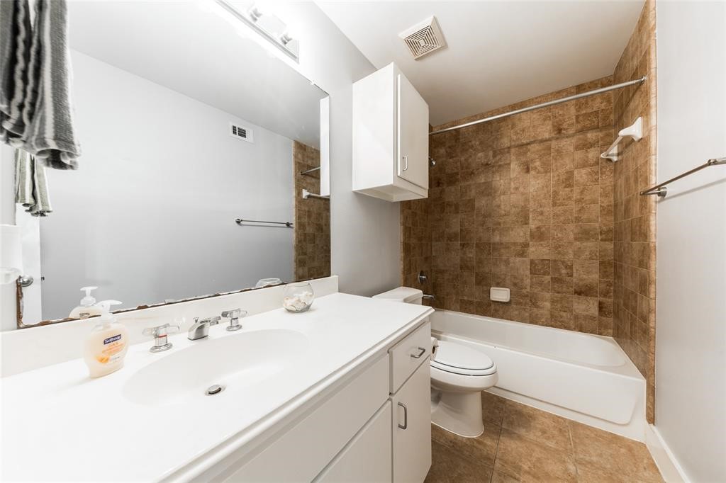 3027 Buttercup Street Houston, TX 77063 - Photo 21 of 29 a bathroom with a sink toilet and shower