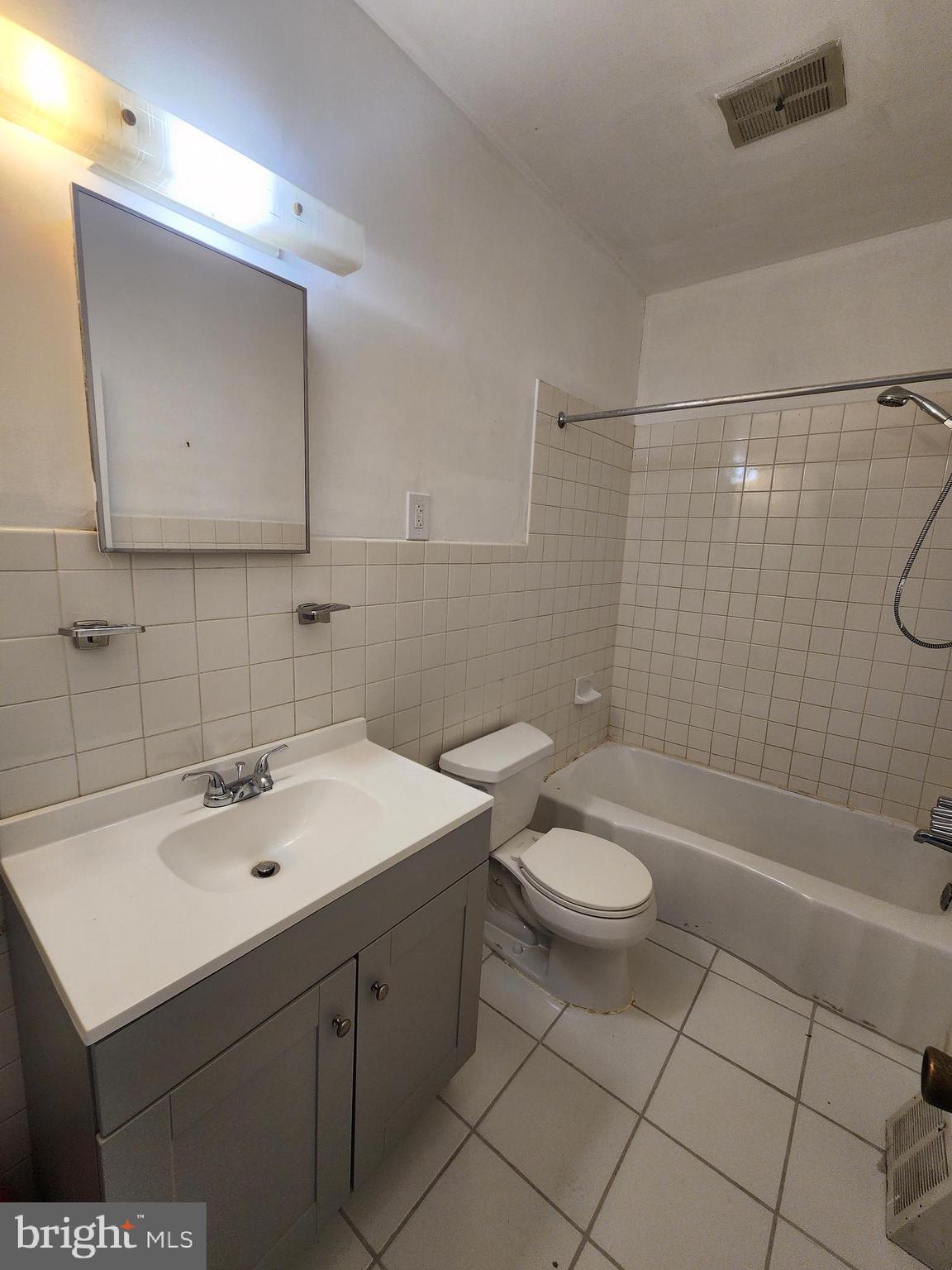 6616 Leeds Street Philadelphia, PA 19151 - Photo 25 of 29 a bathroom with a sink toilet and shower