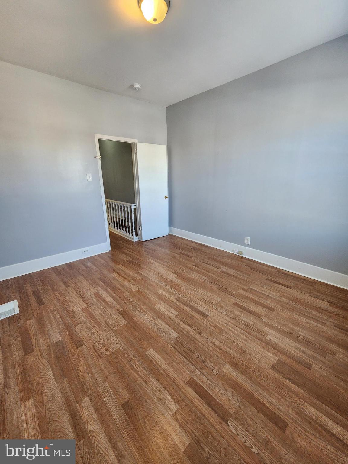 6616 Leeds Street Philadelphia, PA 19151 - Photo 28 of 29 wooden floor in an empty room