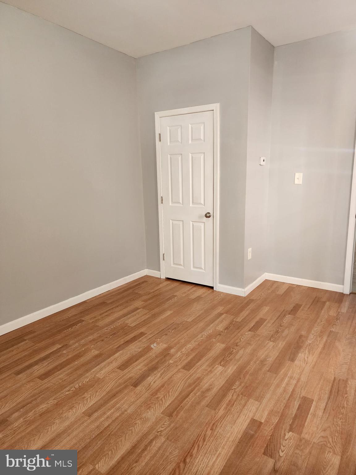 6616 Leeds Street Philadelphia, PA 19151 - Photo 10 of 29 a view of empty room with wooden floor