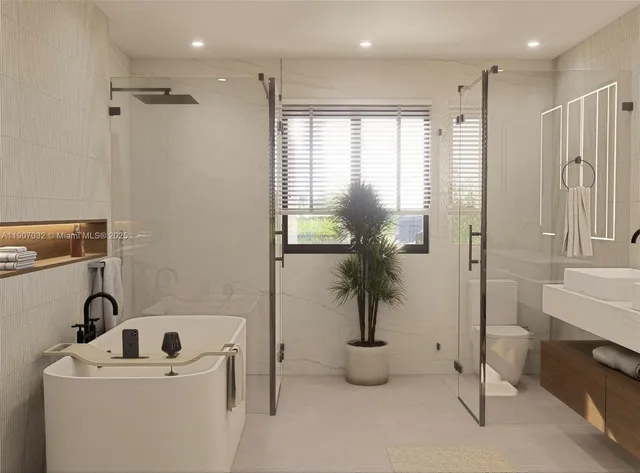a bathroom with a bathtub and a shower