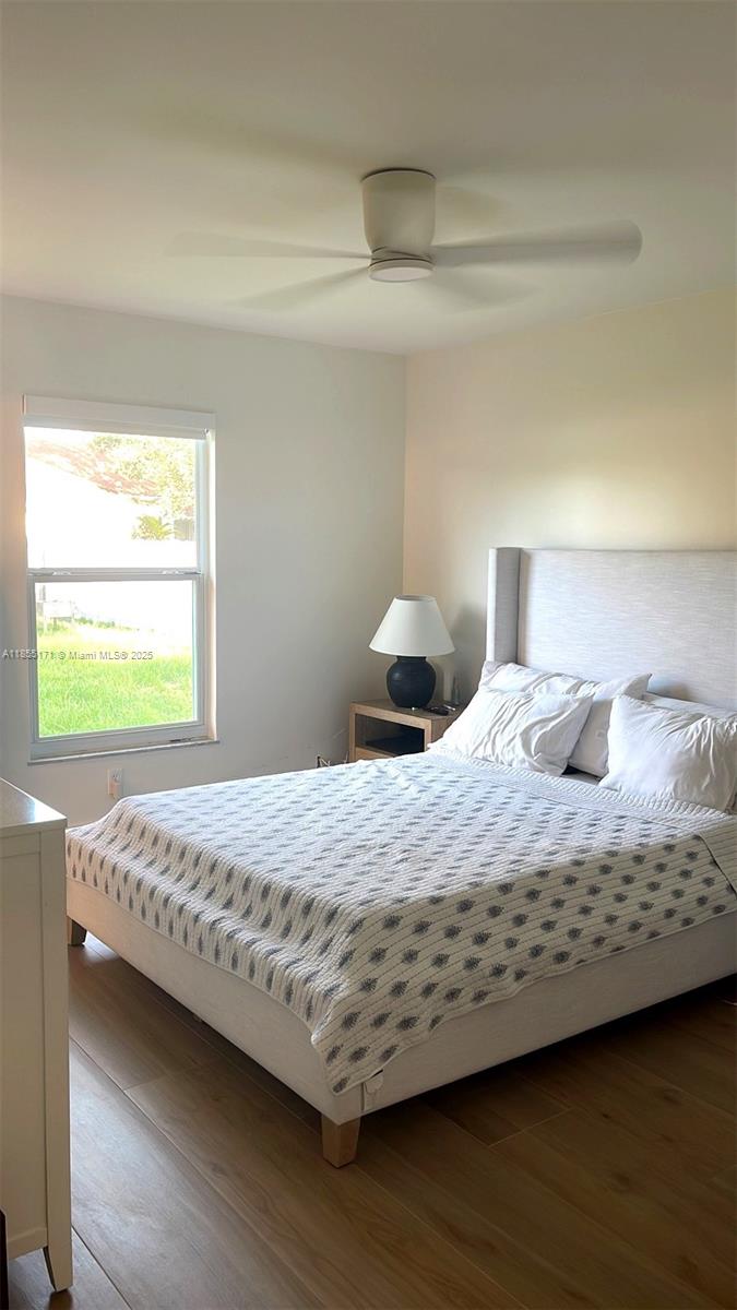 2273 Southwest Mt Vernon Street Port St. Lucie, FL 34953 - Photo 5 of 9 a bedroom with a bed and window