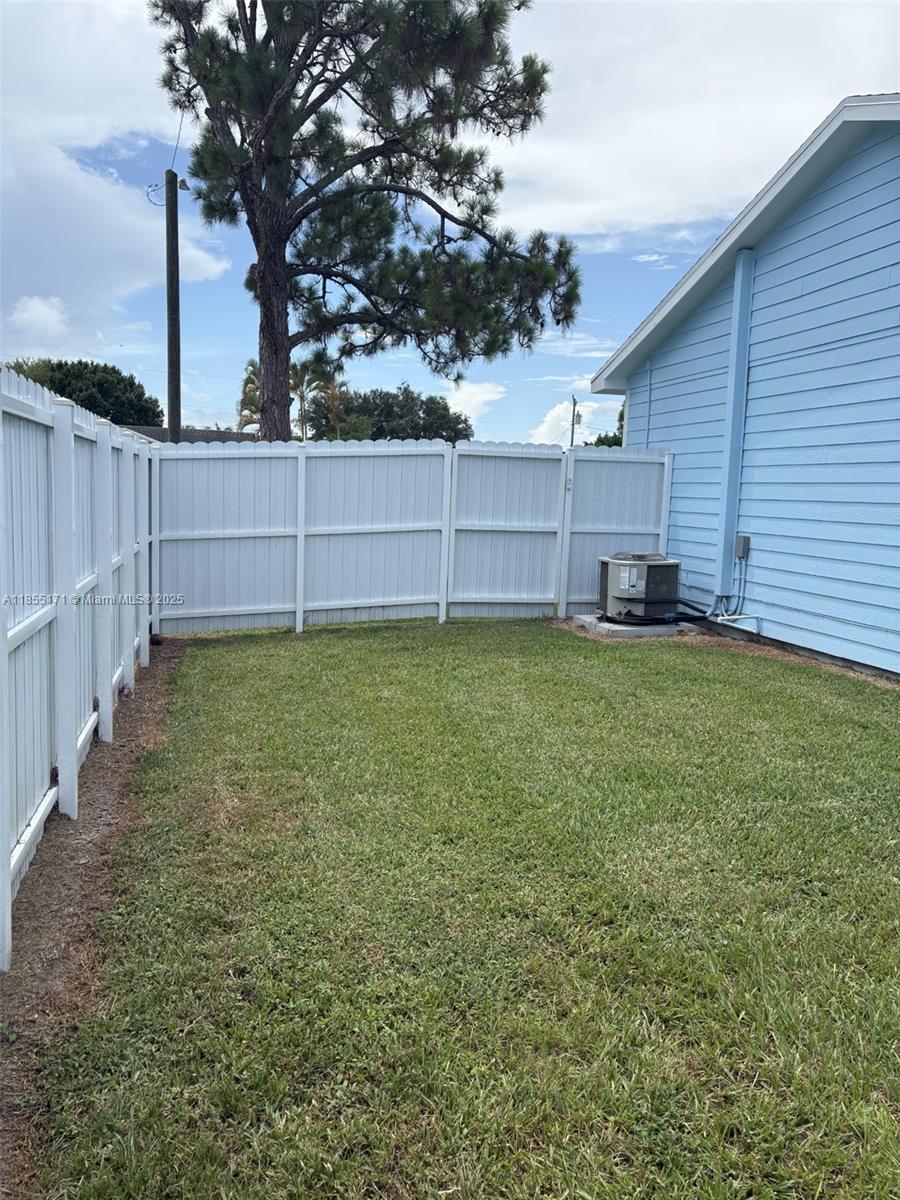 2273 Southwest Mt Vernon Street Port St. Lucie, FL 34953 - Photo 7 of 9 a view of a backyard