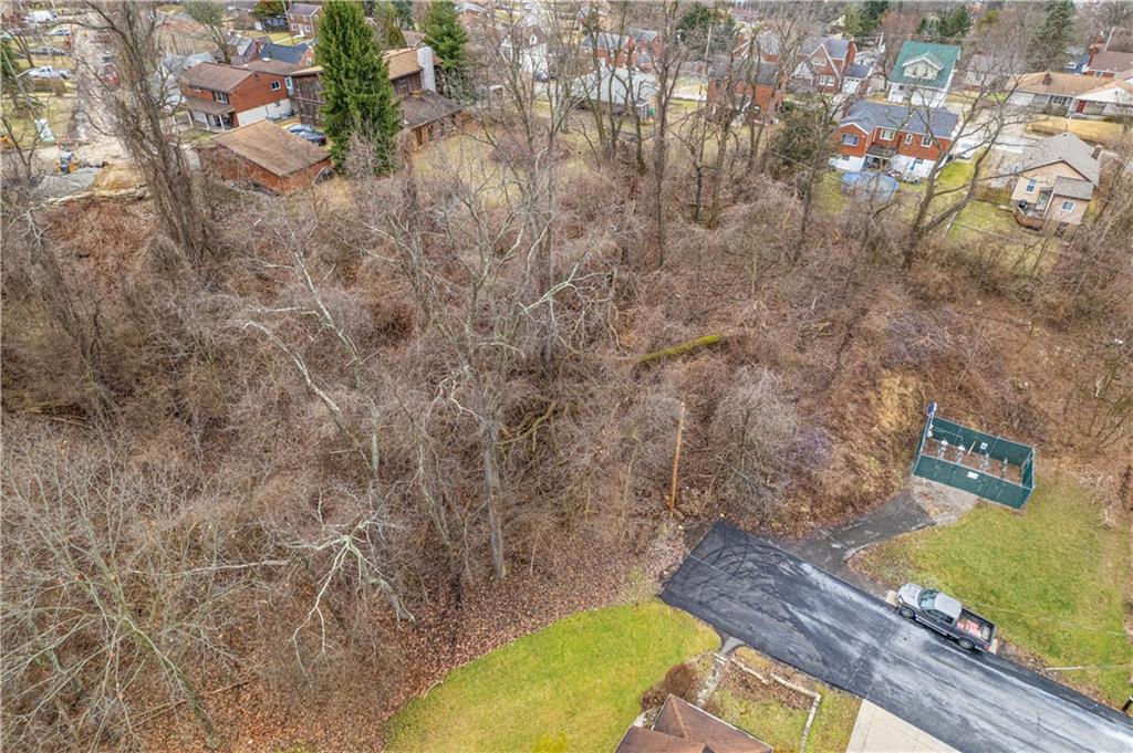 0 Elmdale Road Pittsburgh, PA 15205 - Photo 7 of 12 a view of a backyard with plants and wooden fence
