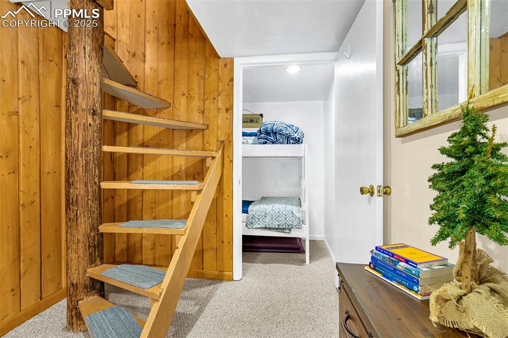 5870 Paona Road Cascade, CO 80809 - Photo 17 of 32 a view of walk in closet with clothes and shoes