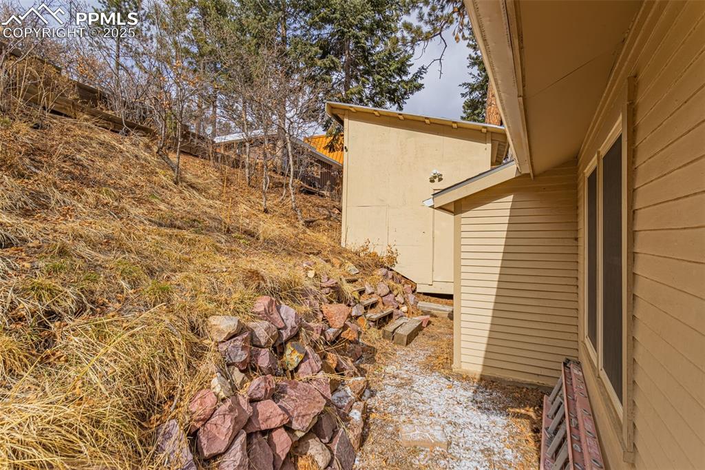 5870 Paona Road Cascade, CO 80809 - Photo 18 of 32 a view of a wooden door
