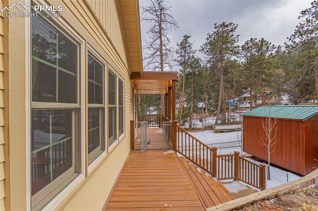 5870 Paona Road Cascade, CO 80809 - Photo 19 of 32 a view of a balcony with chairs