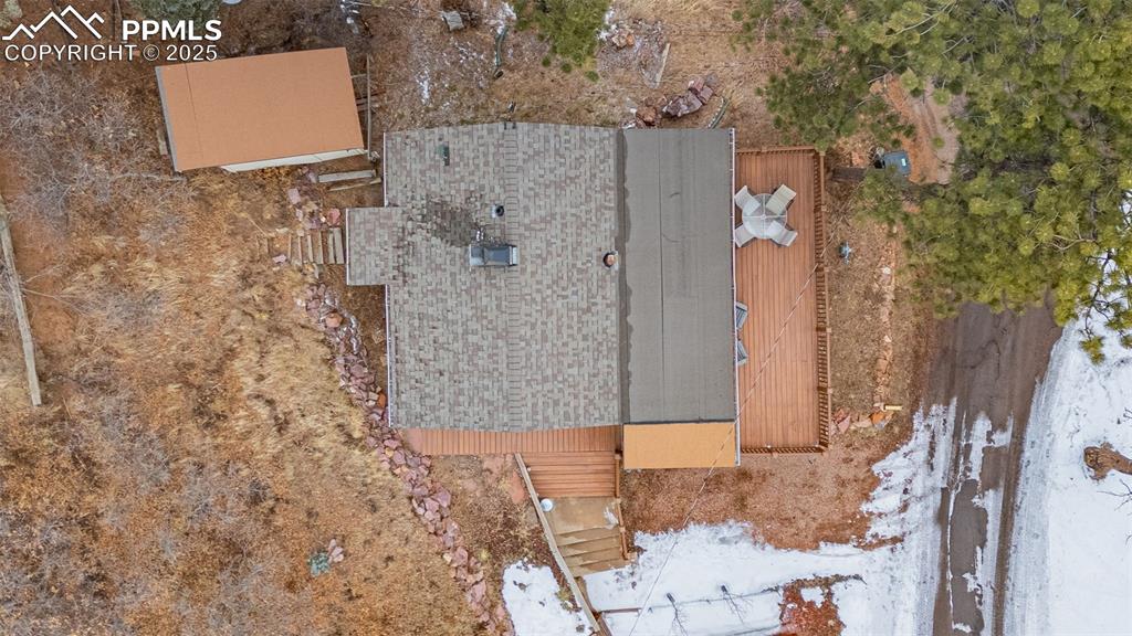 5870 Paona Road Cascade, CO 80809 - Photo 23 of 32 a bathroom with a shower and a sink