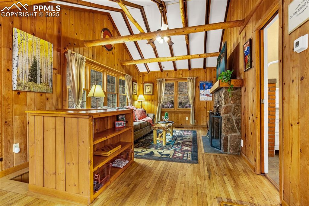5870 Paona Road Cascade, CO 80809 - Photo 3 of 32 a view of an entryway with wooden floor