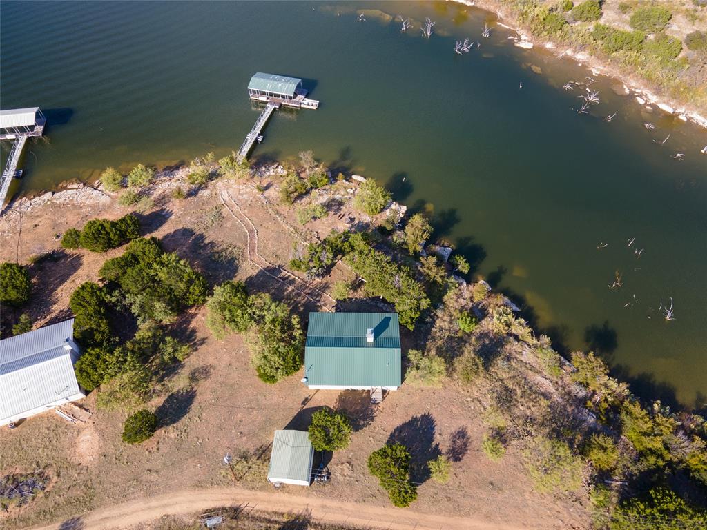 3500 Hog Bend, Unit 135 Graford, TX 76449 - Photo 12 of 34 a vase of flowers sitting on a table