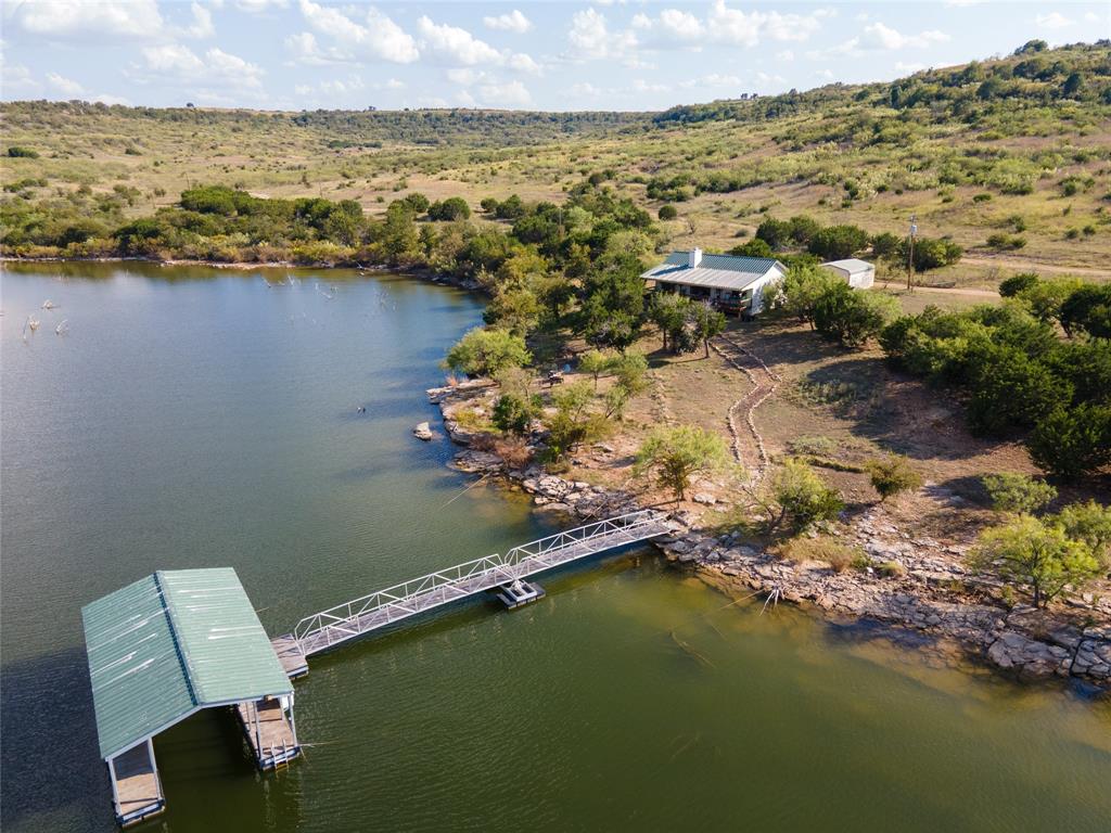 3500 Hog Bend, Unit 135 Graford, TX 76449 - Photo 2 of 34 a view of a lake with a mountain