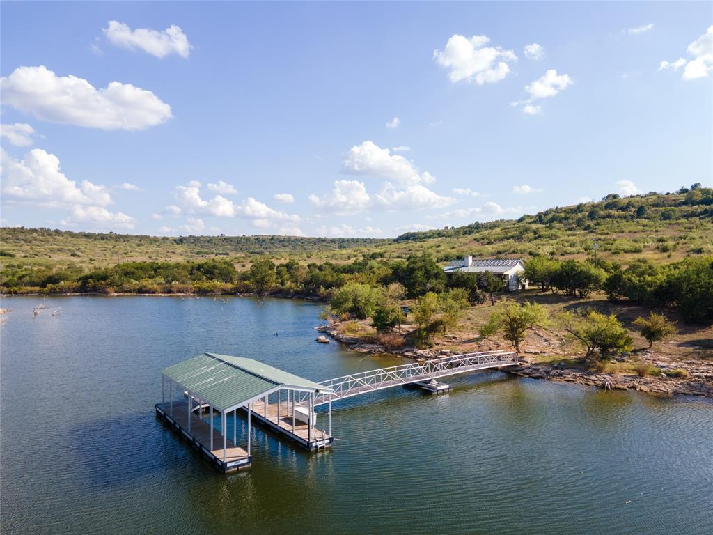 3500 Hog Bend, Unit 135 Graford, TX 76449 - Photo 25 of 34 a view of a lake with a mountain