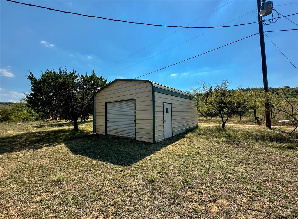 3500 Hog Bend, Unit 135 Graford, TX 76449 - Photo 33 of 34 a view of a backyard of the house