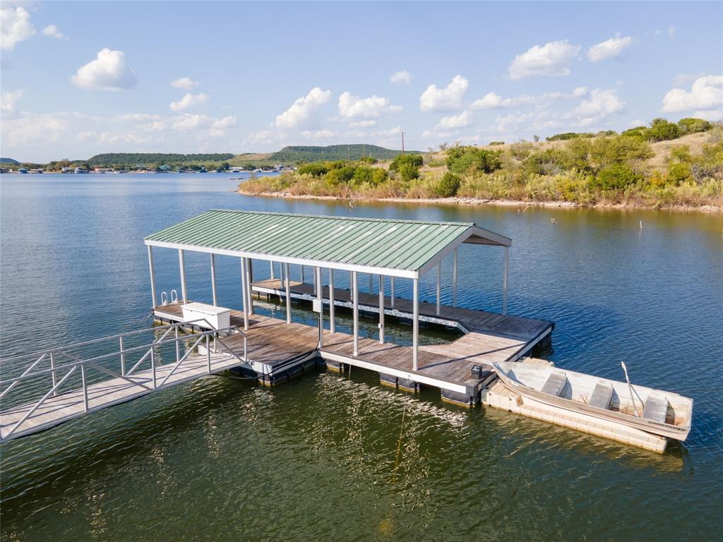 3500 Hog Bend, Unit 135 Graford, TX 76449 - Photo 6 of 34 a view of a lake with a terrace