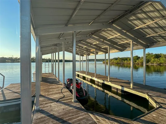 a view of swimming pool with outdoor seating
