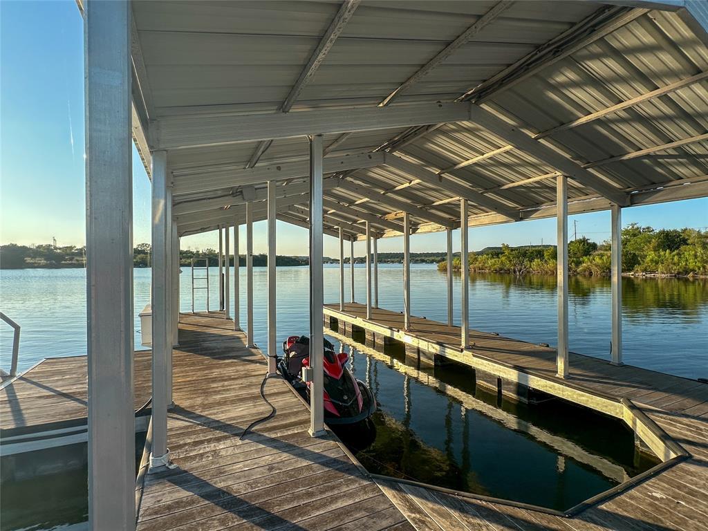 3500 Hog Bend, Unit 135 Graford, TX 76449 - Photo 8 of 34 a view of swimming pool with outdoor seating