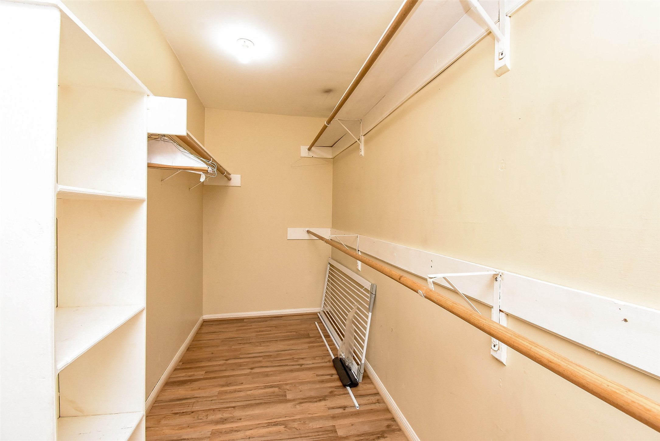 7814 Friars Ct Lane Spring, TX 77379 - Photo 12 of 17 a view of a hallway with wooden floor