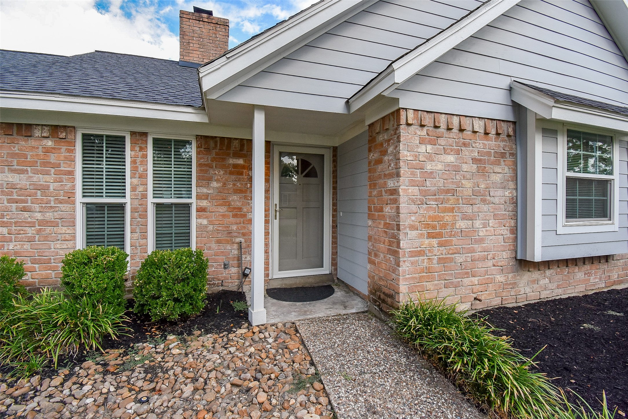 7814 Friars Ct Lane Spring, TX 77379 - Photo 2 of 17 a front view of a house with a yard