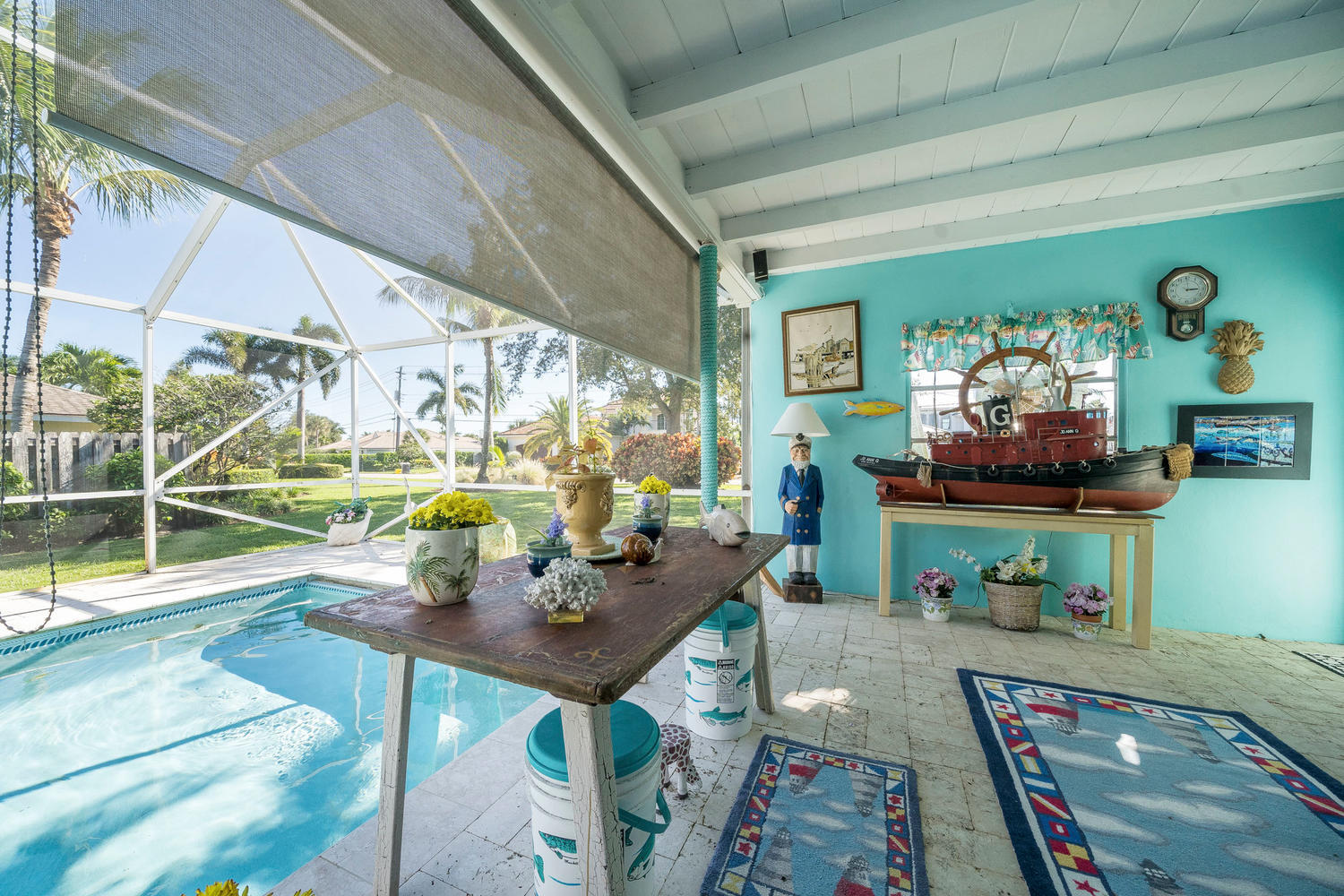 100 River Drive Tequesta, FL 33469 - Photo 14 of 54 a view of a dining room with furniture a chandelier and wooden floor