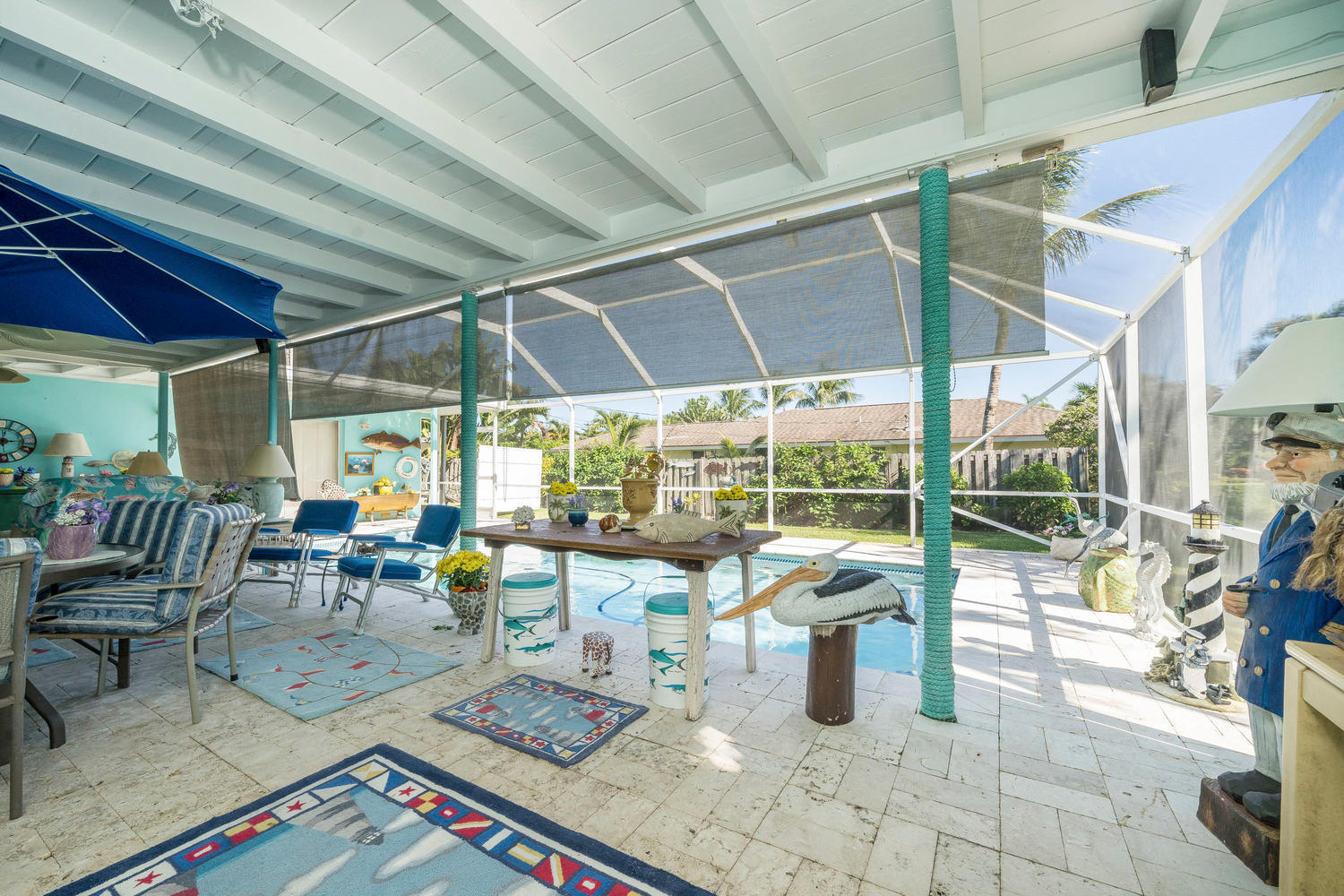 100 River Drive Tequesta, FL 33469 - Photo 15 of 54 a outdoor space with lots of tables a garden view and chairs