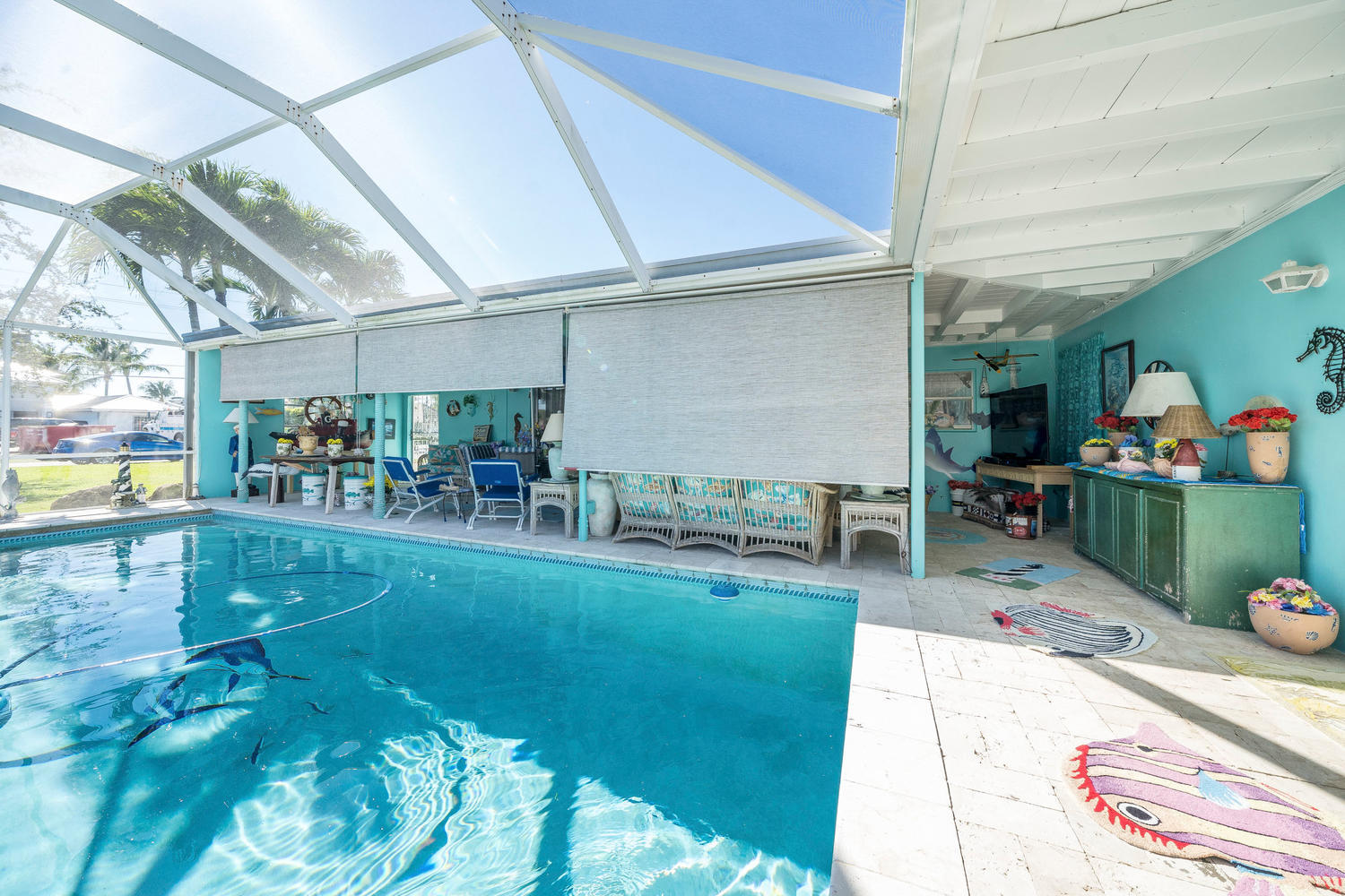100 River Drive Tequesta, FL 33469 - Photo 18 of 54 a living room with lots of furniture and a table
