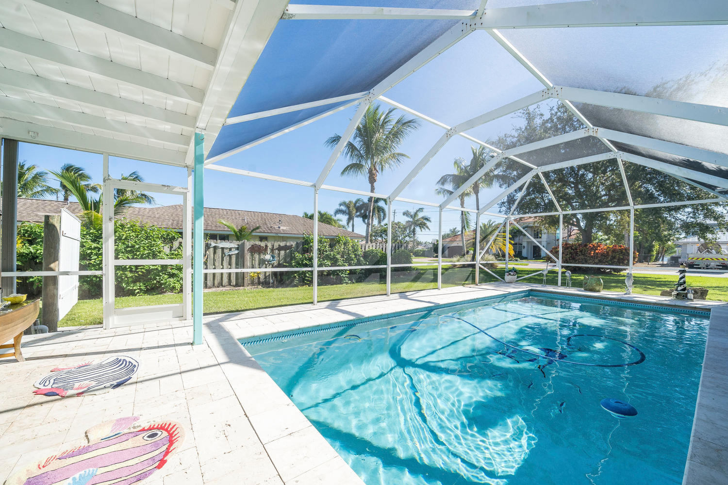 100 River Drive Tequesta, FL 33469 - Photo 19 of 54 a view of a backyard