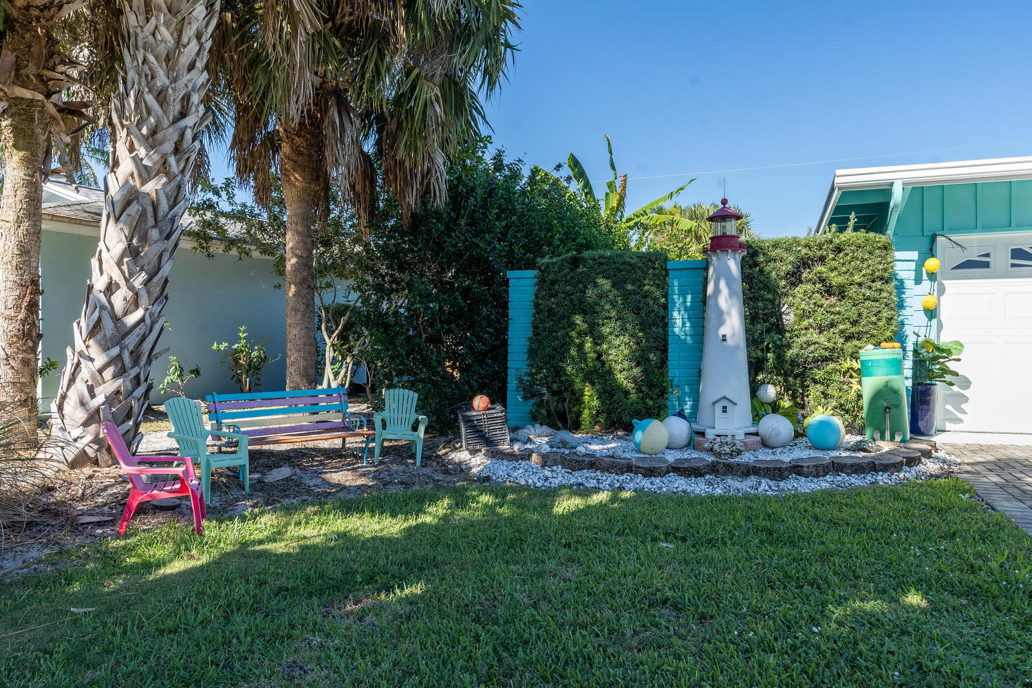 100 River Drive Tequesta, FL 33469 - Photo 35 of 54 a view of outdoor space yard and patio