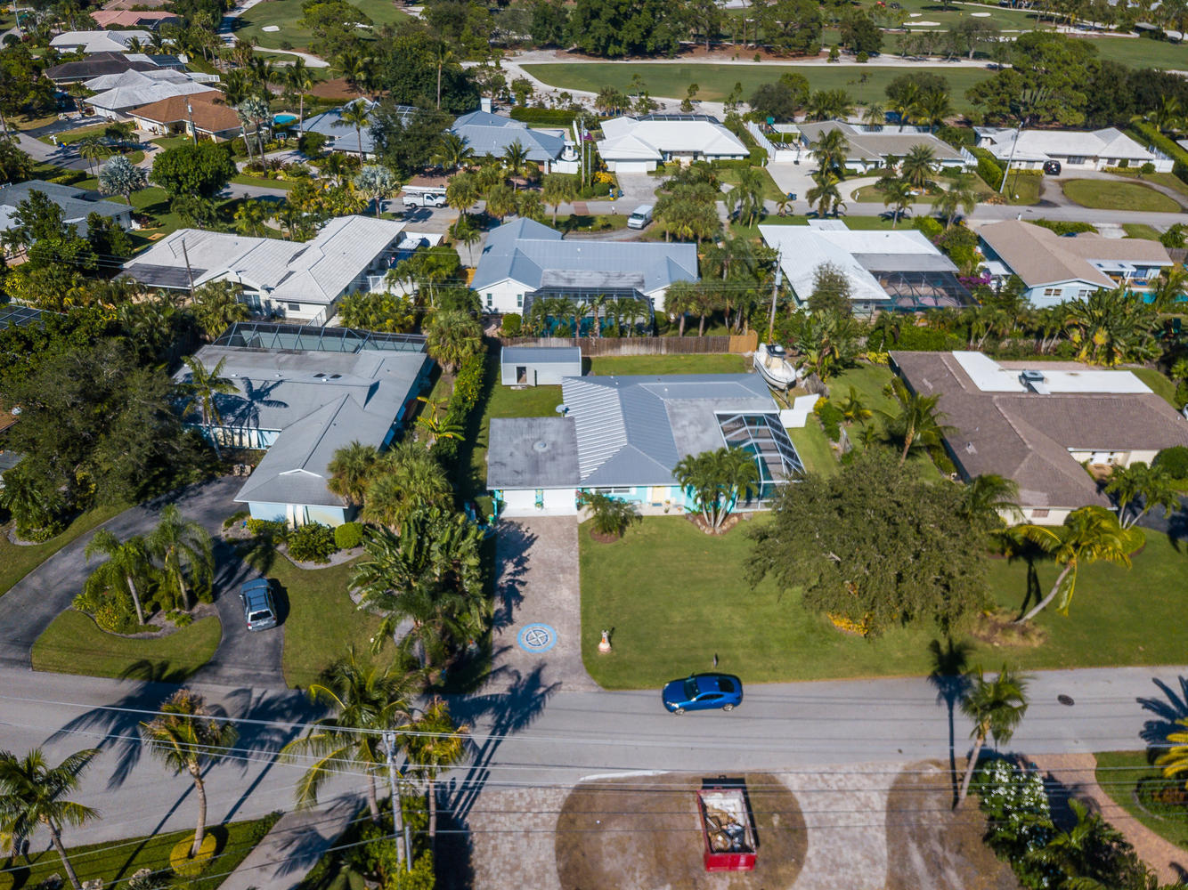 100 River Drive Tequesta, FL 33469 - Photo 37 of 54 an aerial view of a city with lots of residential buildings